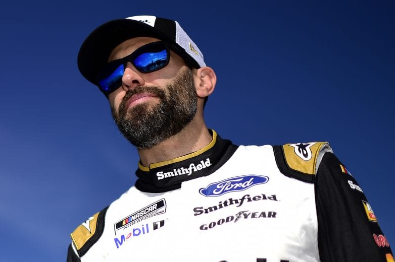 DAYTONA BEACH, FLORIDA - FEBRUARY 09: Aric Almirola, driver of the #10 Smithfield Ford, stands on the grid during qualifying for the NASCAR Cup Series 62nd Annual Daytona 500 at Daytona International Speedway on February 09, 2020 in Daytona Beach, Florida. (Photo by Jared C. Tilton/Getty Images) | Getty Images