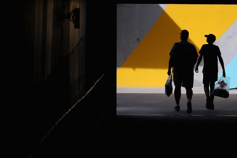 AVONDALE, ARIZONA - MARCH 06: Fans walk through the infield tunnel during practice for the NASCAR Cup Series FanShield 500 at Phoenix Raceway on March 06, 2020 in Avondale, Arizona. (Photo by Christian Petersen/Getty Images) | Getty Images