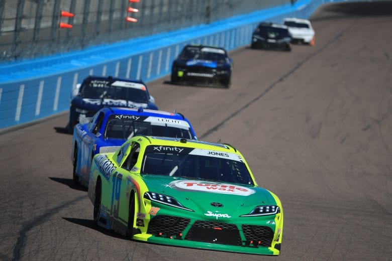AVONDALE, ARIZONA - MARCH 07: Brandon Jones, driver of the #19 Menards/Turtle Wax Toyota, leads a pack of cars during the NASCAR Xfinity Series LS Tractor 200 at Phoenix Raceway on March 07, 2020 in Avondale, Arizona. (Photo by Chris Graythen/Getty Images) | Getty Images
