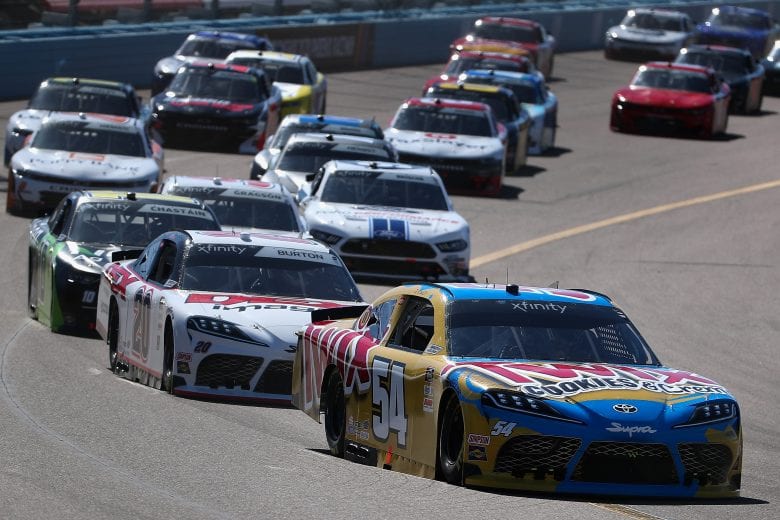 AVONDALE, ARIZONA - MARCH 07:  Kyle Busch, driver of the #54 Twix Cookies & Cream Toyota, leads the pack at the start of the NASCAR Xfinity Series LS Tractor 200 at Phoenix Raceway on March 07, 2020 in Avondale, Arizona. (Photo by Christian Petersen/Getty Images) | Getty Images