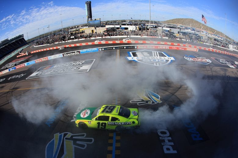 AVONDALE, ARIZONA - MARCH 07: Brandon Jones, driver of the #19 Menards/Turtle Wax Toyota, celebrates after winning during the NASCAR Xfinity Series LS Tractor 200 at Phoenix Raceway on March 07, 2020 in Avondale, Arizona. (Photo by Chris Graythen/Getty Images) | Getty Images