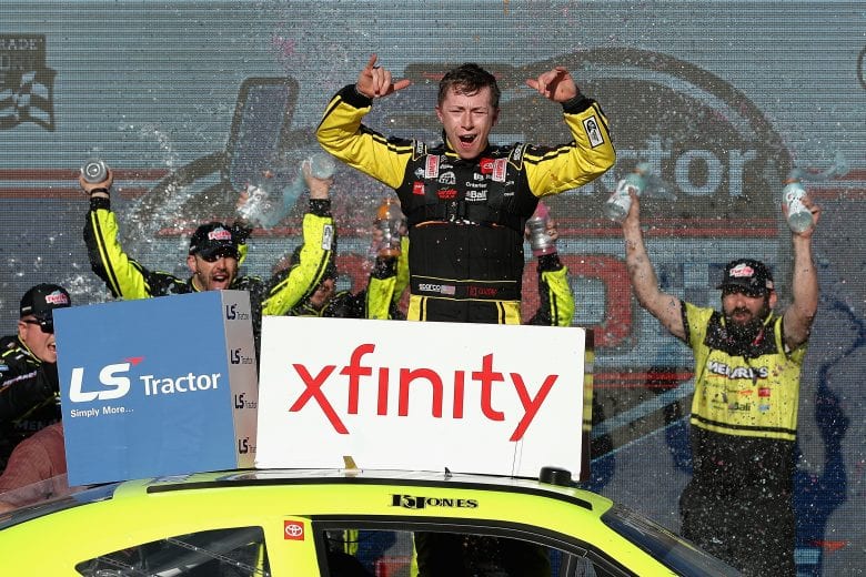 AVONDALE, ARIZONA - MARCH 07: Brandon Jones, driver of the #19 Menards/Turtle Wax Toyota, celebrates in victory lane after winning the NASCAR Xfinity Series LS Tractor 200 at Phoenix Raceway on March 07, 2020 in Avondale, Arizona. (Photo by Christian Petersen/Getty Images) | Getty Images
