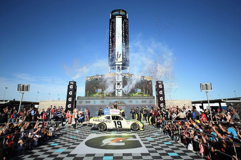 AVONDALE, ARIZONA - MARCH 07: Brandon Jones, driver of the #19 Menards/Turtle Wax Toyota, celebrates in victory lane after winning the NASCAR Xfinity Series LS Tractor 200 at Phoenix Raceway on March 07, 2020 in Avondale, Arizona. (Photo by Christian Petersen/Getty Images) | Getty Images