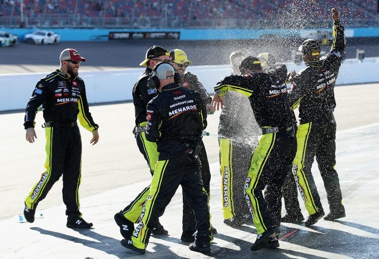 AVONDALE, ARIZONA - MARCH 07: The pit crew for Brandon Jones, driver of the #19 Menards/Turtle Wax Toyota, celebrates after winning the NASCAR Xfinity Series LS Tractor 200 at Phoenix Raceway on March 07, 2020 in Avondale, Arizona. (Photo by Christian Petersen/Getty Images) | Getty Images