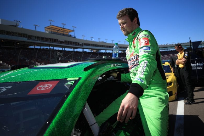 AVONDALE, ARIZONA - MARCH 07: Erik Jones, driver of the #20 Interstate Batteries Toyota, stands on the grid during qualifying for the NASCAR Cup Series FanShield 500 at Phoenix Raceway on March 07, 2020 in Avondale, Arizona. (Photo by Chris Graythen/Getty Images) | Getty Images