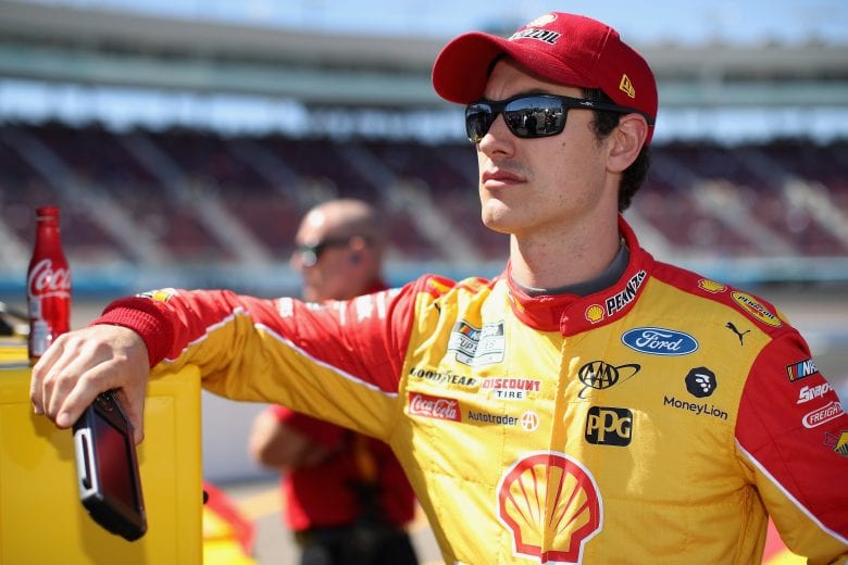 AVONDALE, ARIZONA - MARCH 07: Joey Logano, driver of the #22 Shell Pennzoil Ford, stands on the grid during qualifying for the NASCAR Cup Series FanShield 500 at Phoenix Raceway on March 07, 2020 in Avondale, Arizona. (Photo by Christian Petersen/Getty Images) | Getty Images