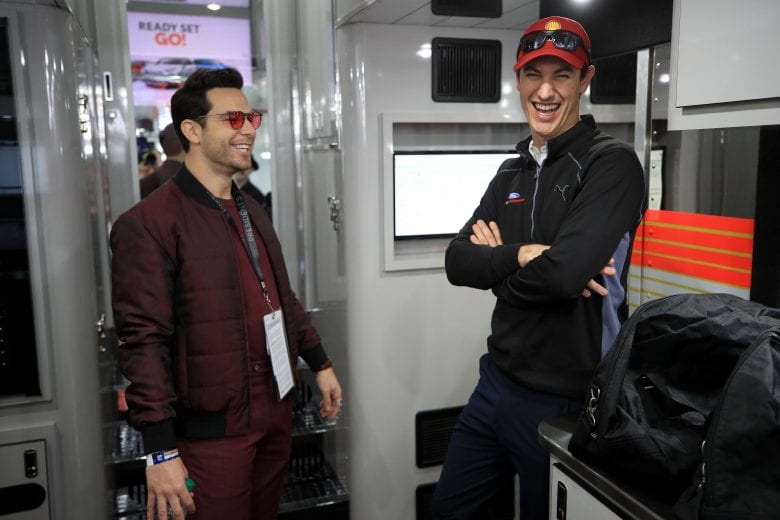 AVONDALE, ARIZONA - MARCH 08: Skylar Astin (L) and Joey Logano, driver of the #22 Shell Pennzoil Ford talk in Logano's hauler prior to the NASCAR Cup Series FanShield 500 at Phoenix Raceway on March 08, 2020 in Avondale, Arizona. (Photo by Chris Graythen/Getty Images) | Getty Images