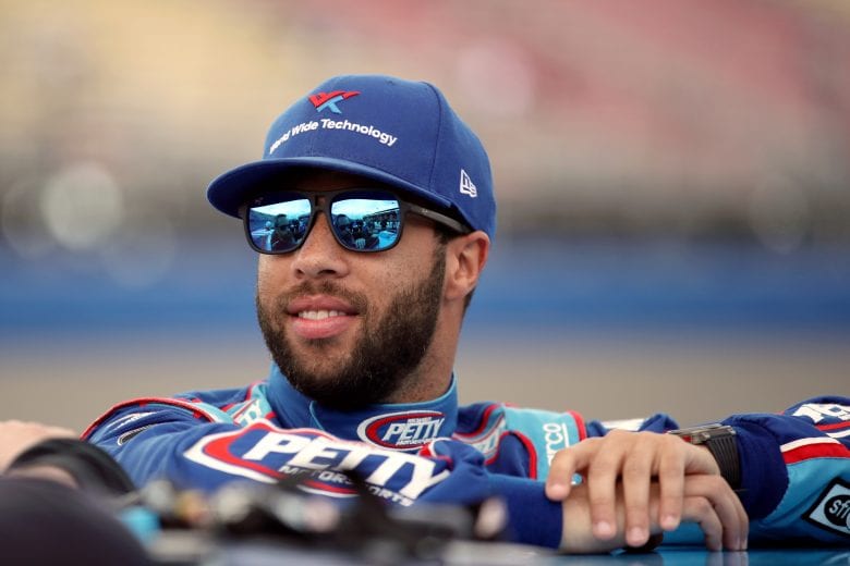 FONTANA, CALIFORNIA - FEBRUARY 29: Bubba Wallace, driver of the #43 Victory Junction Chevrolet, stands by his car before qualifying for the NASCAR Cup Series Auto Club 400 at Auto Club Speedway on February 29, 2020 in Fontana, California. (Photo by Katelyn Mulcahy/Getty Images) | Getty Images