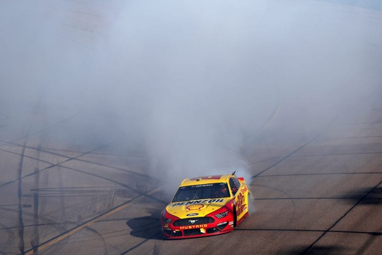 AVONDALE, ARIZONA - MARCH 08: Joey Logano, driver of the #22 Shell Pennzoil Ford, celebrates after winning the NASCAR Cup Series FanShield 500 at Phoenix Raceway on March 08, 2020 in Avondale, Arizona. (Photo by Chris Graythen/Getty Images) | Getty Images