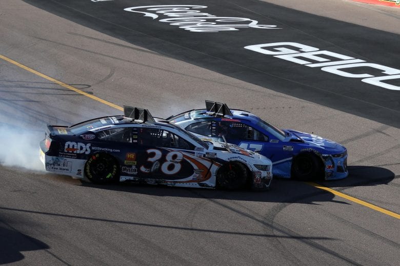 AVONDALE, ARIZONA - MARCH 08: John Hunter Nemechek, driver of the #38 MDS Transport Ford,and Ricky Stenhouse Jr., driver of the #47 Kroger Chevrolet, spin during the NASCAR Cup Series FanShield 500 at Phoenix Raceway on March 08, 2020 in Avondale, Arizona. (Photo by Chris Graythen/Getty Images) | Getty Images
