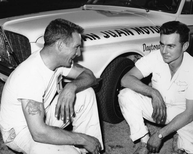DAYTONA BEACH, FL — January 1960:  Larry Frank (L) and Bobby Johns (R) with a pair of Plymouth Valiants they were scheduled to run in a pair of NASCAR Compact Car events at Daytona International Speedway.  Only Frank actually ran the races, finishing in the top three in both events.  (Photo by ISC Images & Archives via Getty Images)