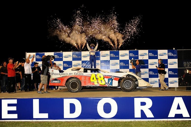 ROSSBURG, OH - JUNE 09:  Jimmie Johnson, driver of the #48 Lowe's late model Chevrolet, celebrates in victory lane after winning the Gillette Fusion ProGlide Prelude to the Dream at Eldora Speedway on June 9, 2010 in Rossburg, Ohio.  (Photo by John Harrelson/Getty Images for True Speed Communication) | Getty Images