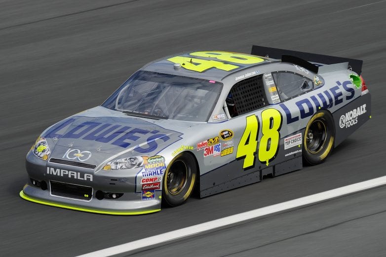 CHARLOTTE, NC - OCTOBER 13:  Jimmie Johnson drives the #48 Lowe's/Chevy 100th Anniversay Chevrolet during practice for the NASCAR Sprint Cup Series Bank of America 500 at Charlotte Motor Speedway on October 13, 2011 in Charlotte, North Carolina.  (Photo by John Harrelson/Getty Images for NASCAR) | Getty Images