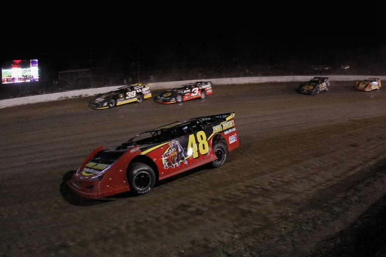 ROSSBURG, OH - JUNE 06:  Jimmie Johnson, driver of the #48 leads a pack of cars during the Feed the Children Prelude to the Dream at Eldora Speedway on June 6, 2012 in Rossburg, Ohio.  (Photo by Chris Graythen/Getty Images for True Speed Communication) | Getty Images