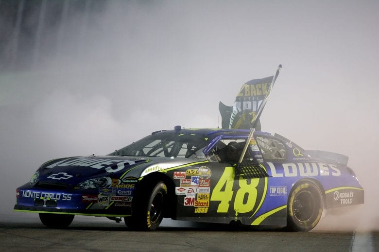 HOMESTEAD, FL - NOVEMBER 18:  Jimmie Johnson, driver of the #48 Lowe's Chevrolet, celebrates after clinching the NASCAR Nextel Cup Series Championship following the Ford 400 at Homestead-Miami Speedway on November 18, 2007 in Homestead, Florida.  (Photo by Robert Laberge/Getty Images for NASCAR) | Getty Images
