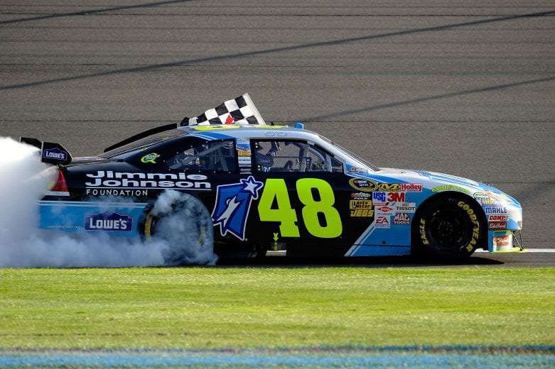 FONTANA, CA - OCTOBER 11:  Jimmie Johnson, driver of the #48 Lowe's Chevrolet, performs a burnout to celebrate winning the NASCAR Sprint Cup Series Pepsi 500 at Auto Club Speedway on October 11, 2009 in Fontana, California.  (Photo by Rusty Jarrett/Getty Images for NASCAR) | Getty Images