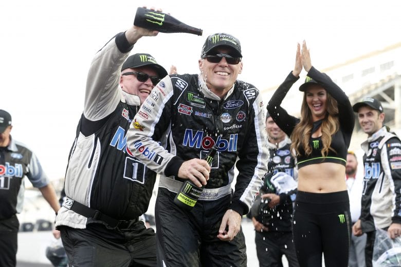 INDIANAPOLIS, INDIANA - SEPTEMBER 08: Kevin Harvick, driver of the #4 Mobil 1 Ford, celebrates after winning the Monster Energy NASCAR Cup Series Big Machine Vodka 400 at the Brickyard at Indianapolis Motor Speedway on September 08, 2019 in Indianapolis, Indiana. (Photo by Brian Lawdermilk/Getty Images) | Getty Images
