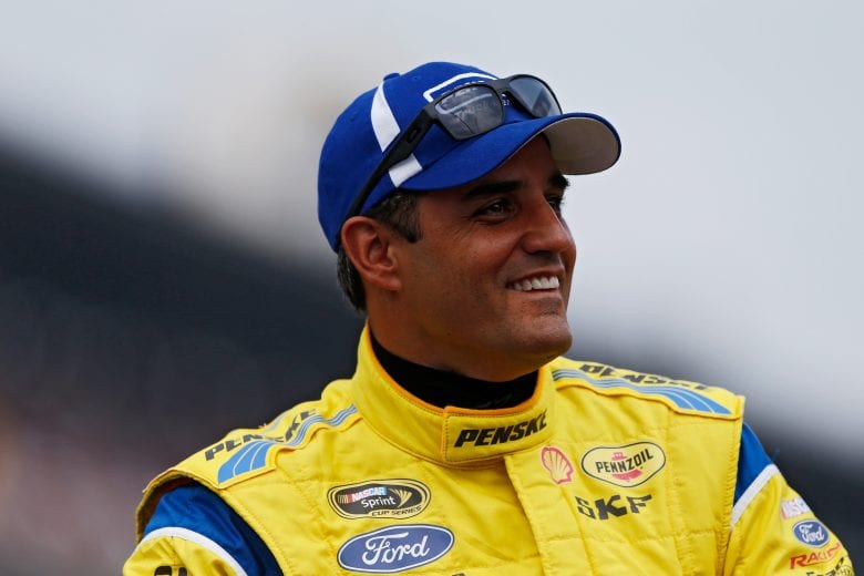 INDIANAPOLIS, IN - JULY 27:  Juan Pablo Montoya, driver of the #12 Penske Truck Rental Ford, participates in pre-race ceremonies for the NASCAR Sprint Cup Series Crown Royal Presents The John Wayne Walding 400 at the Brickyard Indianapolis Motor Speedway on July 27, 2014 in Indianapolis, Indiana.  (Photo by Sean Gardner/Getty Images) | Getty Images