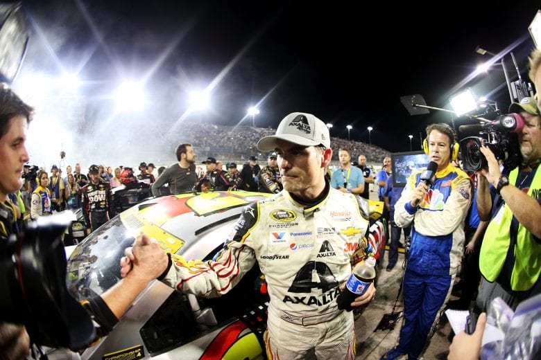 HOMESTEAD, FL - NOVEMBER 22: Jeff Gordon, driver of the #24 AXALTA Chevrolet, climbs from his car after placing sixth in the NASCAR Sprint Cup Series Ford EcoBoost 400 at Homestead-Miami Speedway on November 22, 2015 in Homestead, Florida. (Photo by Sean Gardner/Getty Images) | Getty Images