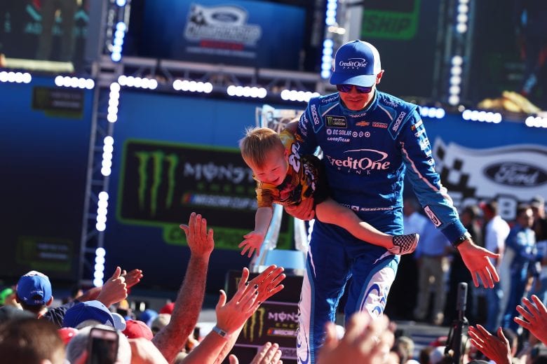 HOMESTEAD, FL - NOVEMBER 19: Kyle Larson, driver of the #42 Credit One/DC Solar Chevrolet, waves to the crowd during introductions prior to the Monster Energy NASCAR Cup Series Championship Ford EcoBoost 400 at Homestead-Miami Speedway on November 19, 2017 in Homestead, Florida. (Photo by Sarah Crabill/Getty Images) | Getty Images
