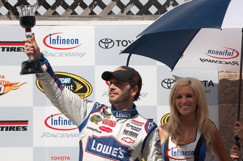 SONOMA, CA - JUNE 20: Jimmie Johnson, driver of the #48 Lowe's Chevrolet, celebrates in the winners circle after winning the NASCAR Sprint Cup Series Toyota/Save Mart 350 at Infineon Raceway on June 20, 2010 in Sonoma, California. (Photo by Chris Graythen/Getty Images for NASCAR) | Getty Images