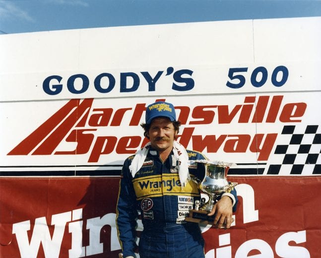 MARTINSVILLE, VA — September 22, 1985:  Dale Earnhardt holds his trophy in victory lane at Martinsville Speedway after winning the Goody’s 500 NASCAR Cup race.  (Photo by ISC Images & Archives via Getty Images)