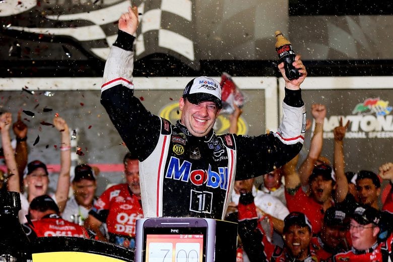 DAYTONA BEACH, FL - JULY 07:  Tony Stewart, driver of the #14 Mobil 1/Office Depot Chevrolet, celebrates in Victory Lane after winning the NASCAR Sprint Cup Series Coke Zero 400 Powered by Coca-Cola at Daytona International Speedway on July 7, 2012 in Daytona Beach, Florida.  (Photo by Mike Ehrmann/Getty Images) | Getty Images