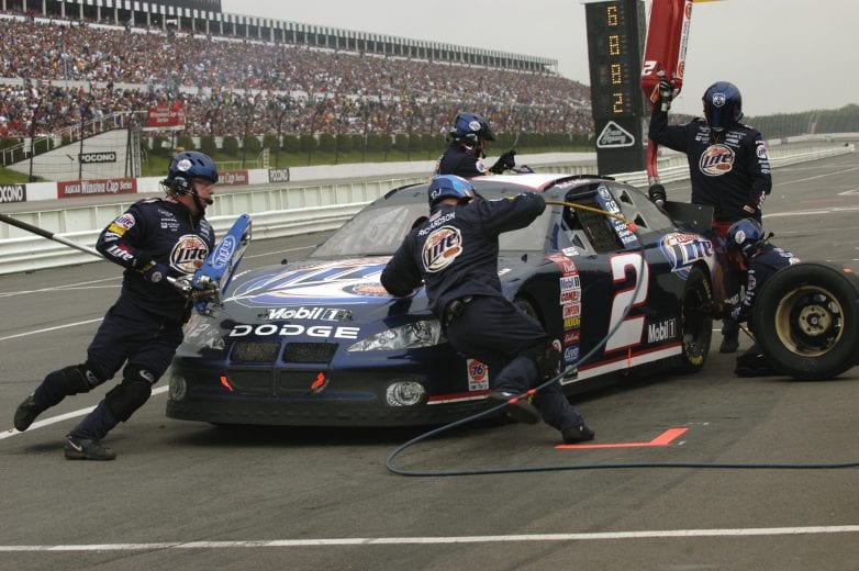 LONG POND, PA - JUNE 8:   Rusty Wallace, driver of the #2 Penske Racing Dodge Intrepid, makes a pit stop during the NASCAR Pocono 500 on June 8, 2003 at the Pocono Raceway in Long Pond, Pennsylvania. (Photo by:  Rusty Jarrett/Getty Images) | Getty Images