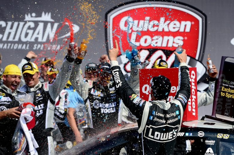 BROOKLYN, MI - JUNE 15:  Jimmie Johnson, driver of the #48 Lowe's/Kobalt Tools Chevrolet, celebrates in Victory Lane after winning the NASCAR Sprint Cup Series Quicken Loans 400 at Michigan International Speedway on June 15, 2014 in Brooklyn, Michigan.  (Photo by Patrick Smith/Getty Images) | Getty Images
