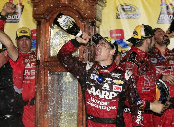 MARTINSVILLE, VA - NOVEMBER 01:  Jeff Gordon, driver of the #24 AARP Member Advantages Chevrolet, and his team celebrate in Victory Lane after winning the NASCAR Sprint Cup Series Goody's Headache Relief Shot 500 at Martinsville Speedway on November 1, 2015 in Martinsville, Virginia.  (Photo by Chris Trotman/NASCAR via Getty Images)