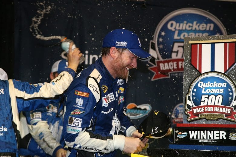 AVONDALE, AZ - NOVEMBER 15: Dale Earnhardt Jr., driver of the #88 Nationwide Chevrolet, celebrates in victory lane after winning the rain-shortened NASCAR Sprint Cup Series Quicken Loans Race for Heroes 500 at Phoenix International Raceway on November 15, 2015 in Avondale, Arizona. (Photo by Sean Gardner/Getty Images) | Getty Images
