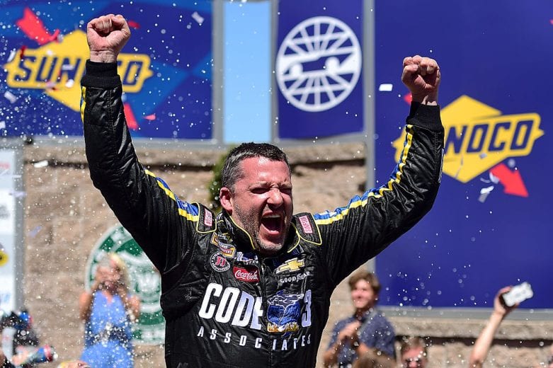 SONOMA, CA - JUNE 26: Tony Stewart, driver of the #14 Code 3 Assoc/Mobil 1 Chevrolet, celebrates in victory lane after winning the NASCAR Sprint Cup Series Toyota/Save Mart 350 at Sonoma Raceway on June 26, 2016 in Sonoma, California. (Photo by Jared C. Tilton/Getty Images) | Getty Images