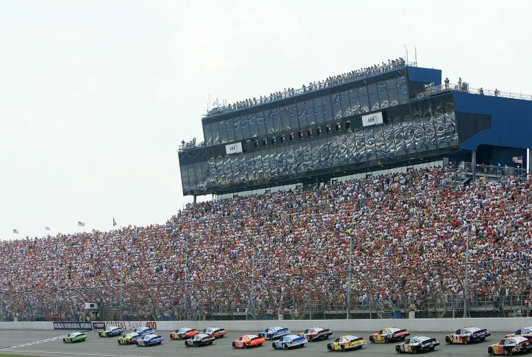 BROOKLYN, MI - JUNE 17:  J.J. Yeley, driver of the #18 Interstate Batteries Chevrolet, and Jimmie Johnson, driver of the #48 Lowe's Chevrolet, lead the field at the start of the NASCAR Nextel Cup Series Citizens Bank 400 at Michigan International Speedway on June 16, 2007 in Brooklyn Michigan.  (Photo by Jerry Markland/Getty Images for NASCAR) | Getty Images