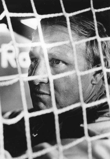 DOVER, DE - MAY 15:  Driver Cale Yarborough waits behind the net for the race to begin at the Mason-Dixon 500 on May 15, 1977 at the Dover Downs International Speedway in Dover. Delaware. (Photo by Dozier Mobley/Getty Images)