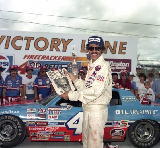 DAYTONA BEACH, FL - JULY 4:  Driver Richard Petty celebrates in Victory Lane after winning his 200th, and final, career race at the Firecracker 400 race on July 4, 1984 at the Daytona International Speedway in Daytona Beach, Florida. (Photo by Dozier Mobley/Getty Images)