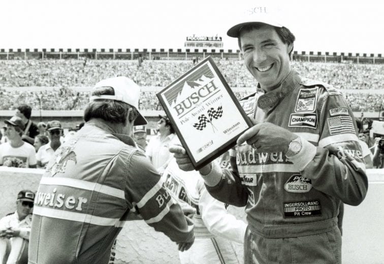LONG POND, PA - JULY 21:  Darrell Waltrip #11 holds the winning pole trophy.  Darrell would take 3rd place and $25,375 for the race on July 21, 1985.  (Photo by Racing Photo Archives/Getty Images)