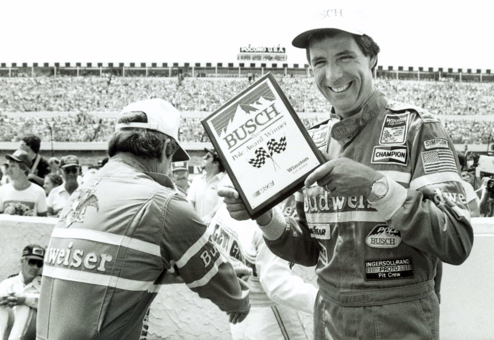 LONG POND, PA - JULY 21:  Darrell Waltrip #11 holds the winning pole trophy.  Darrell would take 3rd place and $25,375 for the race on July 21, 1985.  (Photo by Racing Photo Archives/Getty Images)