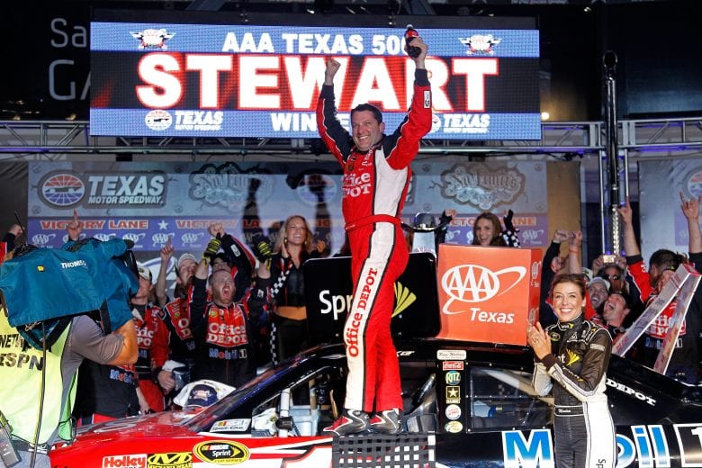 FORT WORTH, TX - NOVEMBER 06:  Tony Stewart, driver of the #14 Office Depot/Mobil 1 Chevrolet, celebrates in victory lane after he won the NASCAR Sprint Cup Series AAA Texas 500 at Texas Motor Speedway on November 6, 2011 in Fort Worth, Texas.  (Photo by Chris Graythen/Getty Images) | Getty Images