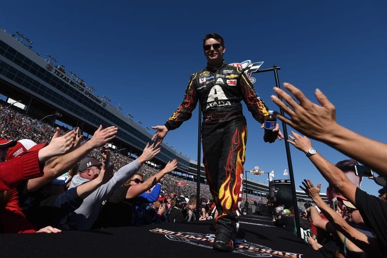 FORT WORTH, TX - NOVEMBER 08:  Jeff Gordon, driver of the #24 Axalta Chevrolet, greets fans during driver introductions prior to the NASCAR Sprint Cup Series AAA Texas 500 at Texas Motor Speedway on November 8, 2015 in Fort Worth, Texas.  (Photo by Rainier Ehrhardt/NASCAR via Getty Images)