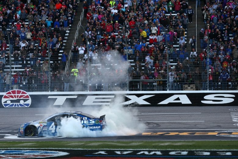 FORT WORTH, TX - NOVEMBER 08:  Jimmie Johnson, driver of the #48 Lowe's Chevrolet, celebrates with a burnout after winning the NASCAR Sprint Cup Series AAA Texas 500 at Texas Motor Speedway on November 8, 2015 in Fort Worth, Texas.  (Photo by Sarah Crabill/Getty Images for Texas Motor Speedway) | Getty Images