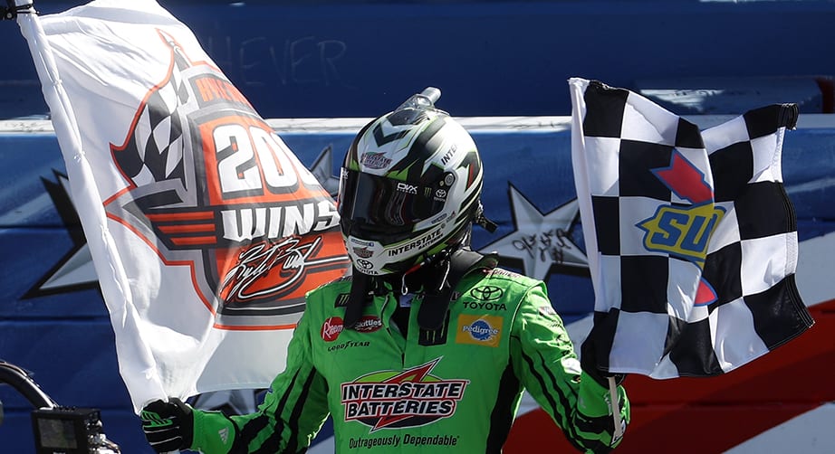 FONTANA, CA - MARCH 17:  Kyle Busch, driver of the #18 Interstate Batteries Toyota, celebrates after winning the Monster Energy NASCAR Cup Series Auto Club 400 and winning his 200th NASCAR race at Auto Club Speedway on March 17, 2019 in Fontana, California.  (Photo by Chris Graythen/Getty Images) | Getty Images