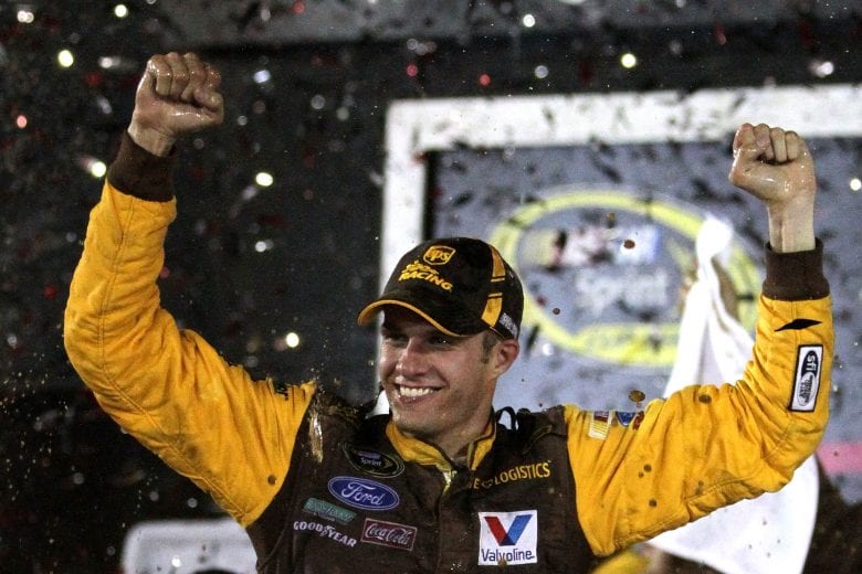 DAYTONA BEACH, FL - JULY 02: David Ragan, driver of the #6 UPS Ford, celebrates with his crew in victory lane after he won the NASCAR Sprint Cup Series Coke ZERO 400 Powered by Coca-Cola at Daytona International Speedway on July 2, 2011 in Daytona Beach, Florida. (Photo by Jerry Markland/Getty Images for NASCAR) | Getty Images