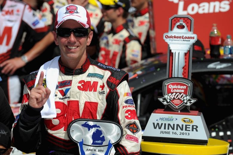 BROOKLYN, MI - JUNE 16: Greg Biffle, driver of the #16 3M/Give Kids a Smile Ford, celebrates in Victory Lane after winning the NASCAR Sprint Cup Series Quicken Loans 400 at Michigan International Speedway on June 16, 2013 in Brooklyn, Michigan. (Photo by Will Schneekloth/Getty Images) | Getty Images