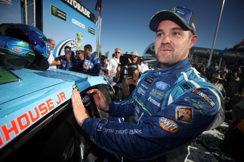 TALLADEGA, AL - MAY 07: Ricky Stenhouse Jr., driver of the #17 Fifth Third Bank Ford, affixes the winner's decal on his car in Victory Lane after winning the Monster Energy NASCAR Cup Series GEICO 500 at Talladega Superspeedway on May 7, 2017 in Talladega, Alabama. (Photo by Chris Graythen/Getty Images) | Getty Images