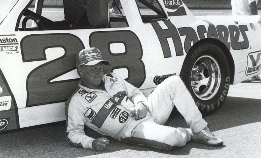 TALLADEGA, AL - MAY 1:  Cale Yarborough relaxes before shattering the qualifying record run of 202.650 mph at Talladega on May 1st 1983. (Photo by Racing Photo Archives/Getty Images)