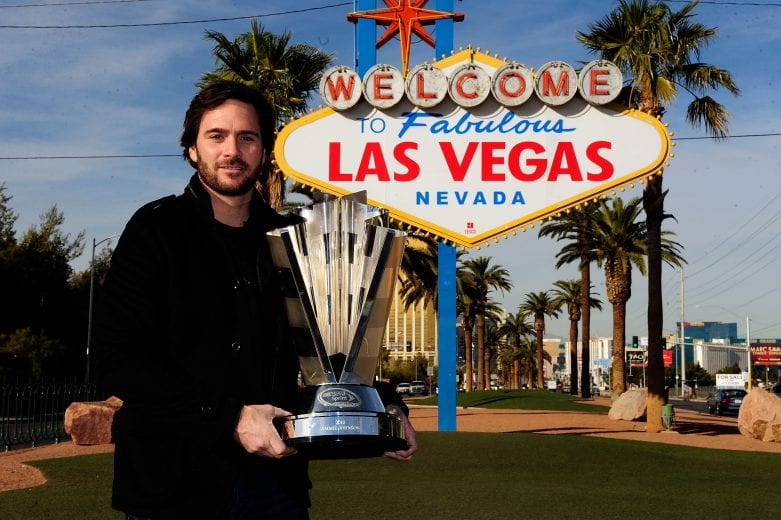 LAS VEGAS, NV - NOVEMBER 30: Five-time NASCAR Sprint Cup Series Champion Jimmie Johnson poses with the 2010 trophy during Day 1 of the NASCAR Sprint Cup Series Champions Week on November 30, 2010 in Las Vegas, Nevada. (Photo by Rusty Jarrett/Getty Images) | Getty Images