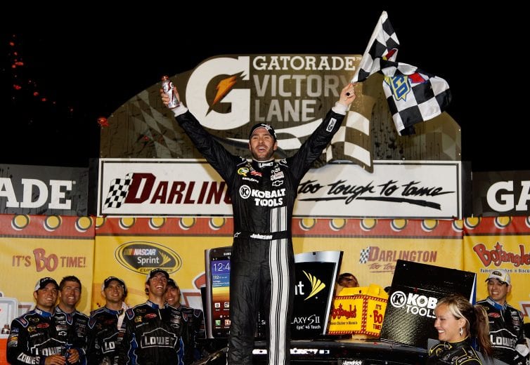 DARLINGTON, SC - MAY 12: Jimmie Johnson, driver of the #48 Lowe's/Kobalt Tools Chevrolet, celebrates in Victory Lane after winning the NASCAR Sprint Cup Series Bojangles' Southern 500 at Darlington Raceway on May 12, 2012 in Darlington, South Carolina. This is the 200th win for Hendrick Motorsports. (Photo by Todd Warshaw/Getty Images) | Getty Images