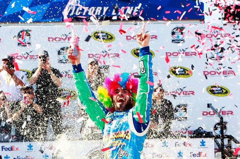 DOVER, DE - JUNE 03: Jimmie Johnson, driver of the #48 Lowe's Madagascar Chevrolet, celebrates in Victory Lane after winning the NASCAR Sprint Cup Series FedEx 400 benefiting Autism Speaks at Dover International Speedway on June 3, 2012 in Dover, Delaware. (Photo by Geoff Burke/Getty Images) | Getty Images