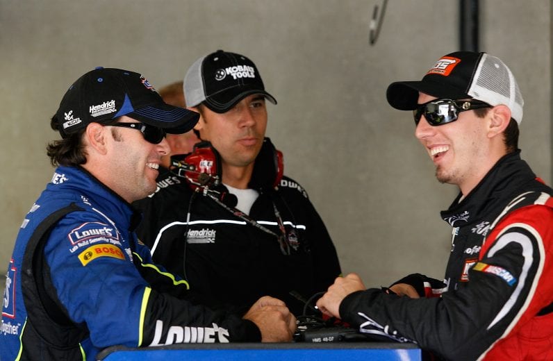 INDIANAPOLIS - JULY 26: Jimmie Johnson, driver of the #48 Lowe's Chevrolet (L), talks with Kyle Busch, driver of the #18 M&M's Toyota (R), prior to practice for the NASCAR Sprint Cup Series Allstate 400 at the Brickyard at Indianapolis Motor Speedway on July 26, 2008 in Indianapolis, Indiana. (Photo by Geoff Burke/Getty Images for NASCAR) | Getty Images
