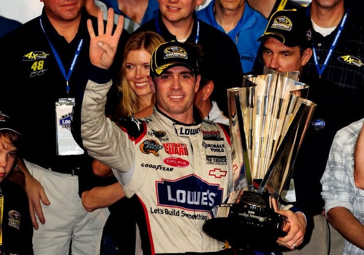 HOMESTEAD, FL - NOVEMBER 22: Jimmie Johnson, driver of the #48 Lowe's Chevrolet, celebrates after winning the NASCAR Sprint Cup Series Championship after finishing in fifth place in the Ford 400 at Homestead-Miami Speedway on November 22, 2009 in Homestead, Florida. Johnson becomes the first driver in the history of NASCAR to win four consecutive championships since the sports inception in 1949.during the NASCAR Sprint Cup Series Ford 400 at Homestead-Miami Speedway on November 22, 2009 in Homestead, Florida. (Photo by Sam Greenwood/Getty Images) | Getty Images